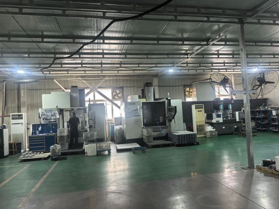 Machining equipment, an operator and tooling cabinets on the production floor