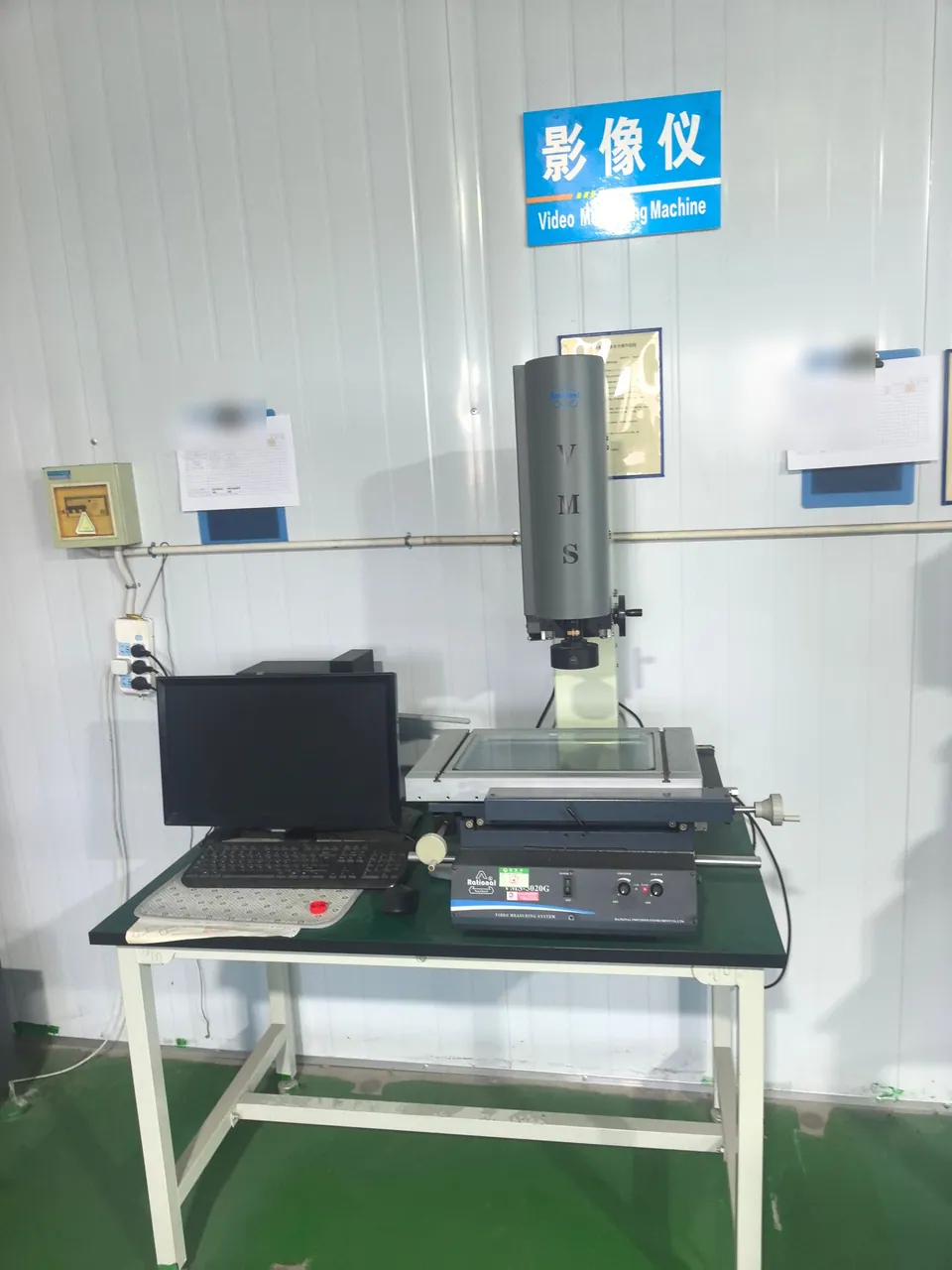 Optical measuring machine with a glass stage and computer workstation